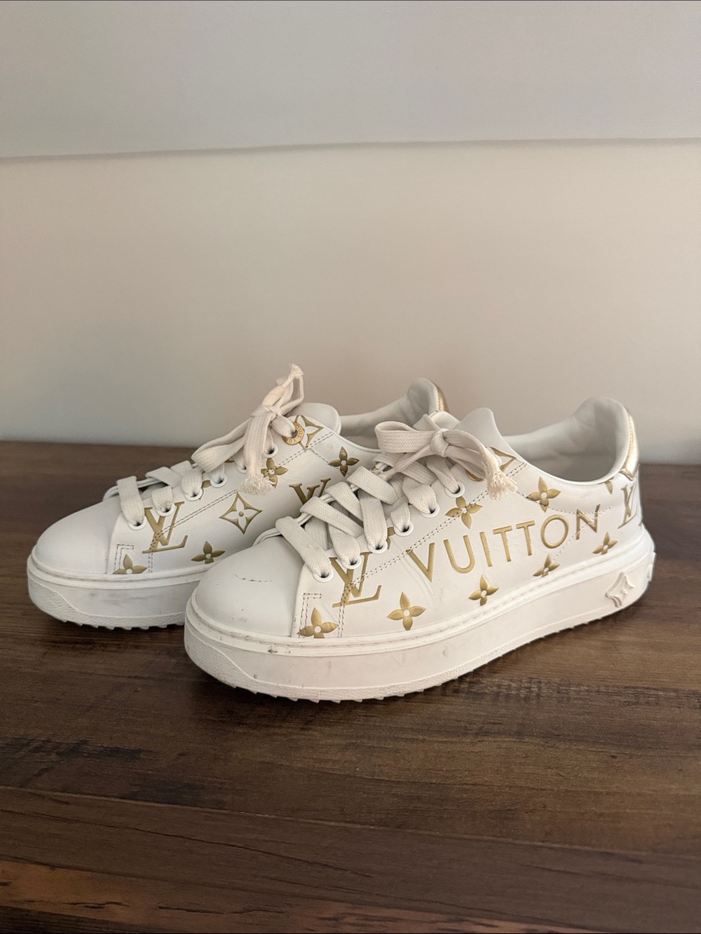 Louis Vuitton White Sneakers with Gold Monogram Accents